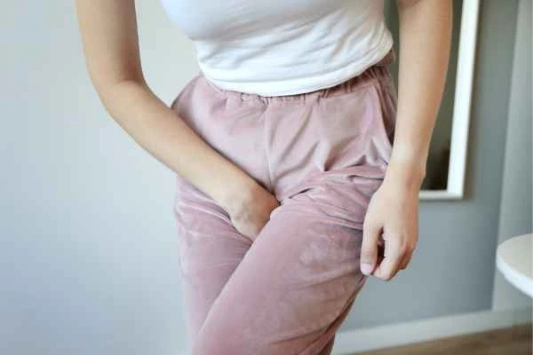 woman struggling with urine incontinence St Johns